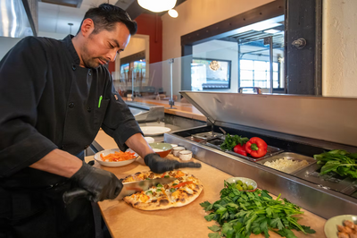 Served with a Side of Microplastics: Common Commercial Kitchen Cutting Surfaces Shed Plastic Dandruff into Food